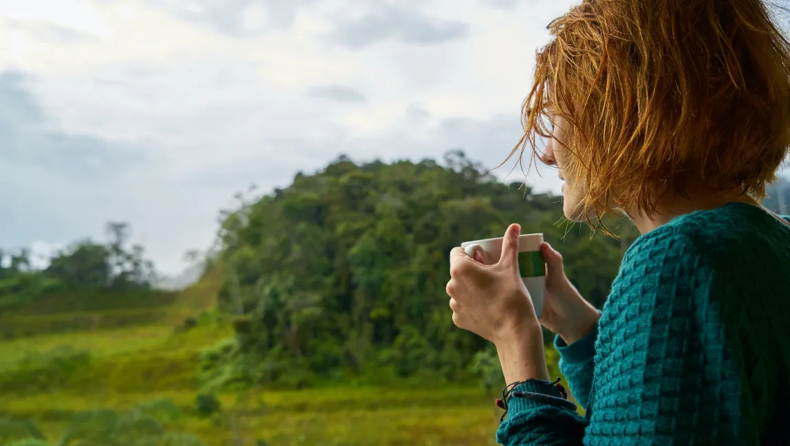 Woman holding a cup of tea